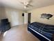 Bedroom with a twin bed, TV, and ceiling fan at 350 Chestnut Dr, Covington, GA 30016