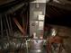 Image of the HVAC unit located in the attic at 350 Chestnut Dr, Covington, GA 30016
