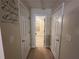 Hallway with doors leading to bedrooms and bathroom at 350 Chestnut Dr, Covington, GA 30016