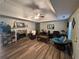 Spacious living room with a fireplace and hardwood floors at 350 Chestnut Dr, Covington, GA 30016