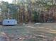 Another view of the metal storage shed in the backyard at 350 Chestnut Dr, Covington, GA 30016