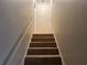 Stairway leading to the second floor at 350 Chestnut Dr, Covington, GA 30016
