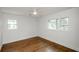 Bright bedroom with hardwood floors and large windows at 4625 Imperial Hills Ct, Tucker, GA 30084