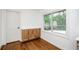 Bright breakfast nook with built-in cabinets and hardwood floors at 4625 Imperial Hills Ct, Tucker, GA 30084