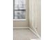 Bright bedroom with neutral walls and carpeted floors at 2213 Asquith Sw Ave, Marietta, GA 30008