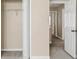 Bedroom with mirrored closet doors and neutral decor at 2213 Asquith Sw Ave, Marietta, GA 30008