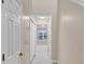 Bright hallway with neutral walls and carpeting at 2213 Asquith Sw Ave, Marietta, GA 30008