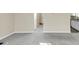 Spacious living room with neutral carpeting and an open floor plan at 2213 Asquith Sw Ave, Marietta, GA 30008