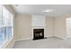Living room with fireplace and large window at 2213 Asquith Sw Ave, Marietta, GA 30008