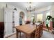 Farmhouse style dining room with wood table and bay window at 281 Orchard Dr, Canton, GA 30115