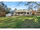 Ranch style home with front porch and landscaped lawn at 281 Orchard Dr, Canton, GA 30115