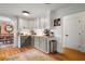 Eat-in kitchen with gray cabinets and a view to the dining room at 281 Orchard Dr, Canton, GA 30115