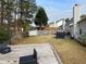 Backyard with wooden deck, storage shed, and fenced yard at 2910 Evergreen Eve Xing, Dacula, GA 30019