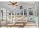 Sunroom with tile floors and plenty of windows offering natural light at 4630 Astible Nw Ct, Acworth, GA 30102