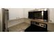 Modern kitchen featuring stainless steel appliances and granite countertops at 5760 Lakeview Dr, Powder Springs, GA 30127