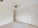 Spacious bedroom with neutral carpet, white walls, and two closets at 2030 Driftwood Unit # U,#D Cir, Cumming, GA 30041