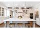 Large kitchen island with marble countertops and white shaker cabinets at 108 Trinity Hollow Drive, Canton, GA 30115