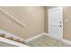 Clean entryway with tile floors and staircase to upper level at 1192 Ashborough Se Dr # E, Marietta, GA 30067