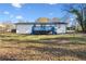 House with blue deck and large backyard at 111 Charles Pl, Cumming, GA 30040
