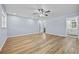 Bright bedroom with ceiling fan and access to bathroom at 111 Charles Pl, Cumming, GA 30040