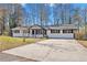 Newly renovated ranch home with a large driveway at 111 Charles Pl, Cumming, GA 30040
