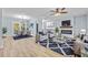 Open living and dining area with fireplace and hardwood floors at 111 Charles Pl, Cumming, GA 30040