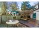 Private backyard with patio and mature trees at 1845 Branch Valley Dr, Roswell, GA 30076