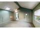 Cozy bedroom with window and access to bathroom at 1845 Branch Valley Dr, Roswell, GA 30076