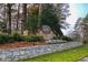 Stone entrance sign of Martins Landing community with festive holiday decor at 1845 Branch Valley Dr, Roswell, GA 30076