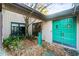 Teal double front doors and a landscaped entryway at 1845 Branch Valley Dr, Roswell, GA 30076