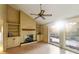 Living room with built-in shelving, fireplace, and hardwood floors at 1845 Branch Valley Dr, Roswell, GA 30076