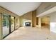 Bright living room featuring a fireplace and sliding glass doors at 1845 Branch Valley Dr, Roswell, GA 30076