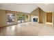 Spacious living room with a brick fireplace and hardwood floors at 1845 Branch Valley Dr, Roswell, GA 30076