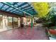 Relaxing patio with pergola, table, and chairs at 1845 Branch Valley Dr, Roswell, GA 30076