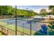 Lakefront tennis courts with stunning views at 1845 Branch Valley Dr, Roswell, GA 30076