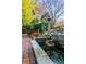 Charming water feature with a whimsical statue and stonework at 1845 Branch Valley Dr, Roswell, GA 30076