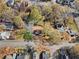 House nestled in a tree-lined neighborhood, seen from an aerial perspective at 3122 Semmes St, Atlanta, GA 30344