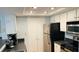 Well-equipped kitchen with stainless steel appliances and ample cabinetry at 1005 Chastain Park Ne Ct # 1005, Atlanta, GA 30342