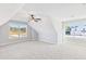 Spacious bedroom with carpeted floor, ceiling fan, and large windows at 106 Red Oak Ln, Carrollton, GA 30116