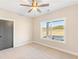 Spacious bedroom with carpet flooring and large window at 106 Red Oak Ln, Carrollton, GA 30116