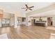 Open concept kitchen with a large island, white cabinets, and herringbone backsplash at 106 Red Oak Ln, Carrollton, GA 30116