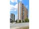 High-rise building with brick and light-colored facade at 215 Piedmont Ne Ave # 2208, Atlanta, GA 30308