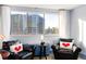 Relaxing sitting area with city views and comfortable armchairs at 215 Piedmont Ne Ave # 2208, Atlanta, GA 30308