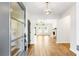 Bright entryway with hardwood floors and view of living room at 102 Red Oak Ln, Carrollton, GA 30116