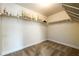 Large walk-in closet with shelving for storage at 2910 Blake Towers Ln, Buford, GA 30519