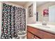 Clean and bright bathroom with shower/tub combo and modern vanity at 132 Eagle Rock Dr, Acworth, GA 30101