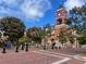 Quaint town square with historic courthouse, landscaping, and brick-paved walkways at 67 Rocking Wood Vw, Dallas, GA 30157