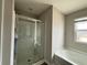 Bathroom features a shower/tub combo and updated vanity at 2125 Waycross Ln, Dacula, GA 30019