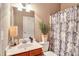 Clean bathroom with shower/tub combo and updated vanity at 2384 Allsborough Way, Dacula, GA 30019