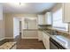 Updated kitchen with granite countertops and stainless steel appliances at 2498 N Bryan Cir, Atlanta, GA 30344